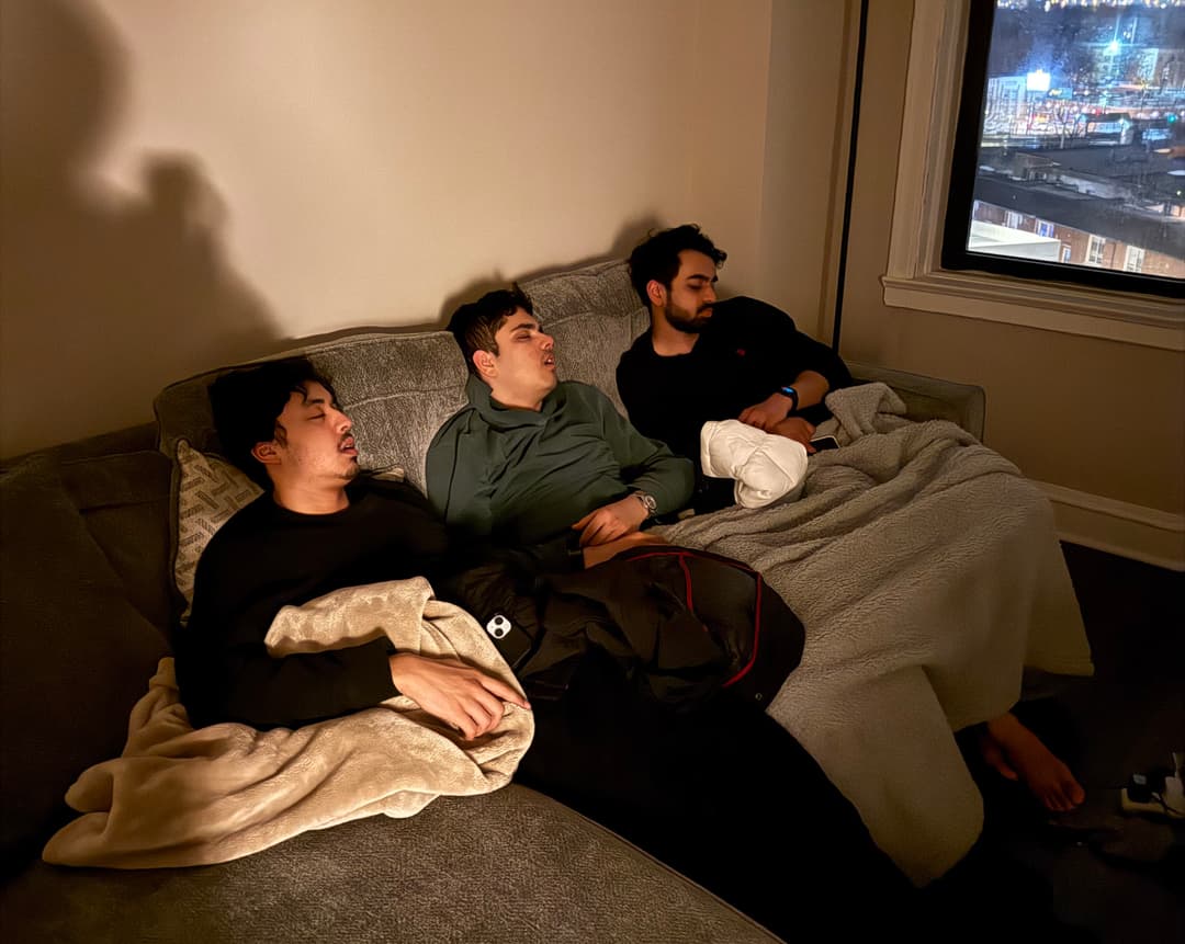 SweetBeasts founders sleeping on a couch