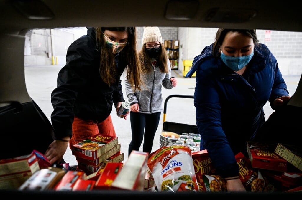 Volunteers preparing food bags at UW–Madison’s Open Seat Food Pantry